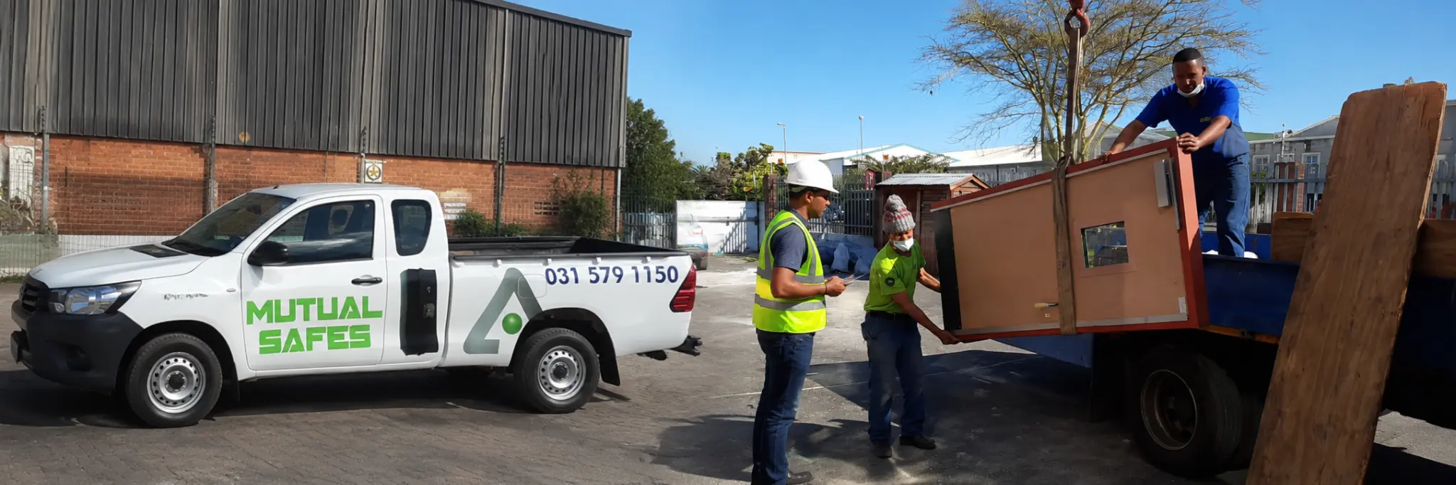Mutual's team handling a security panel at a project site